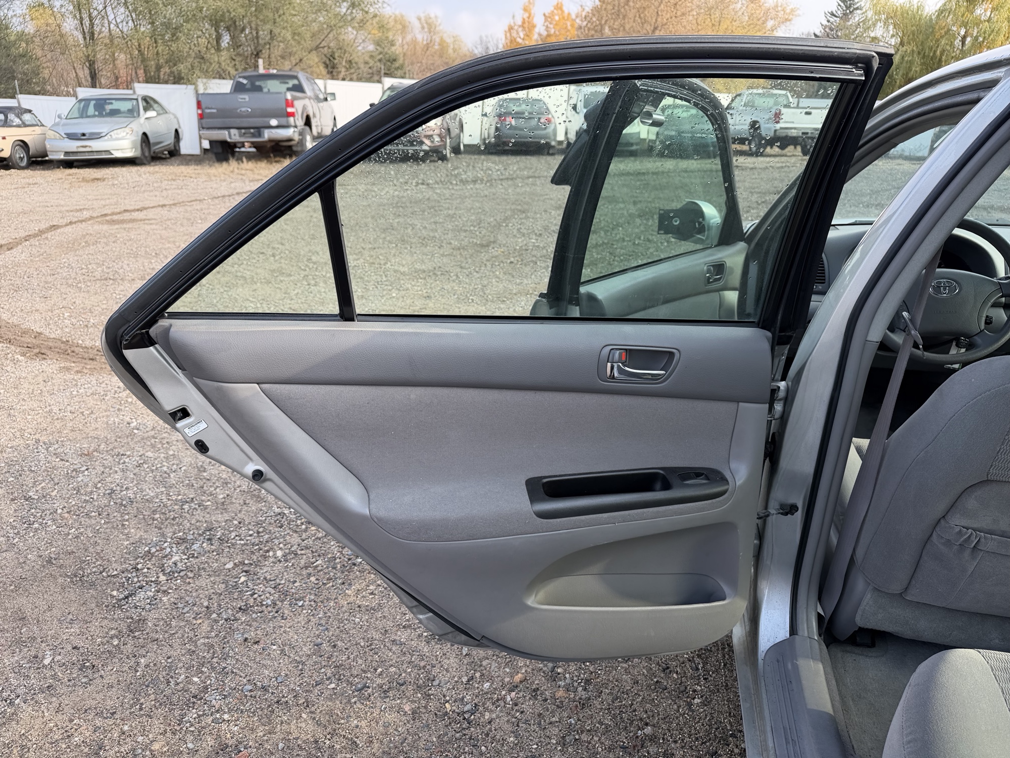 2005 toyota camry le with 145231 miles for sale near Elk River, Minnesota 106937_25_drv_rear_door_panel.jpg