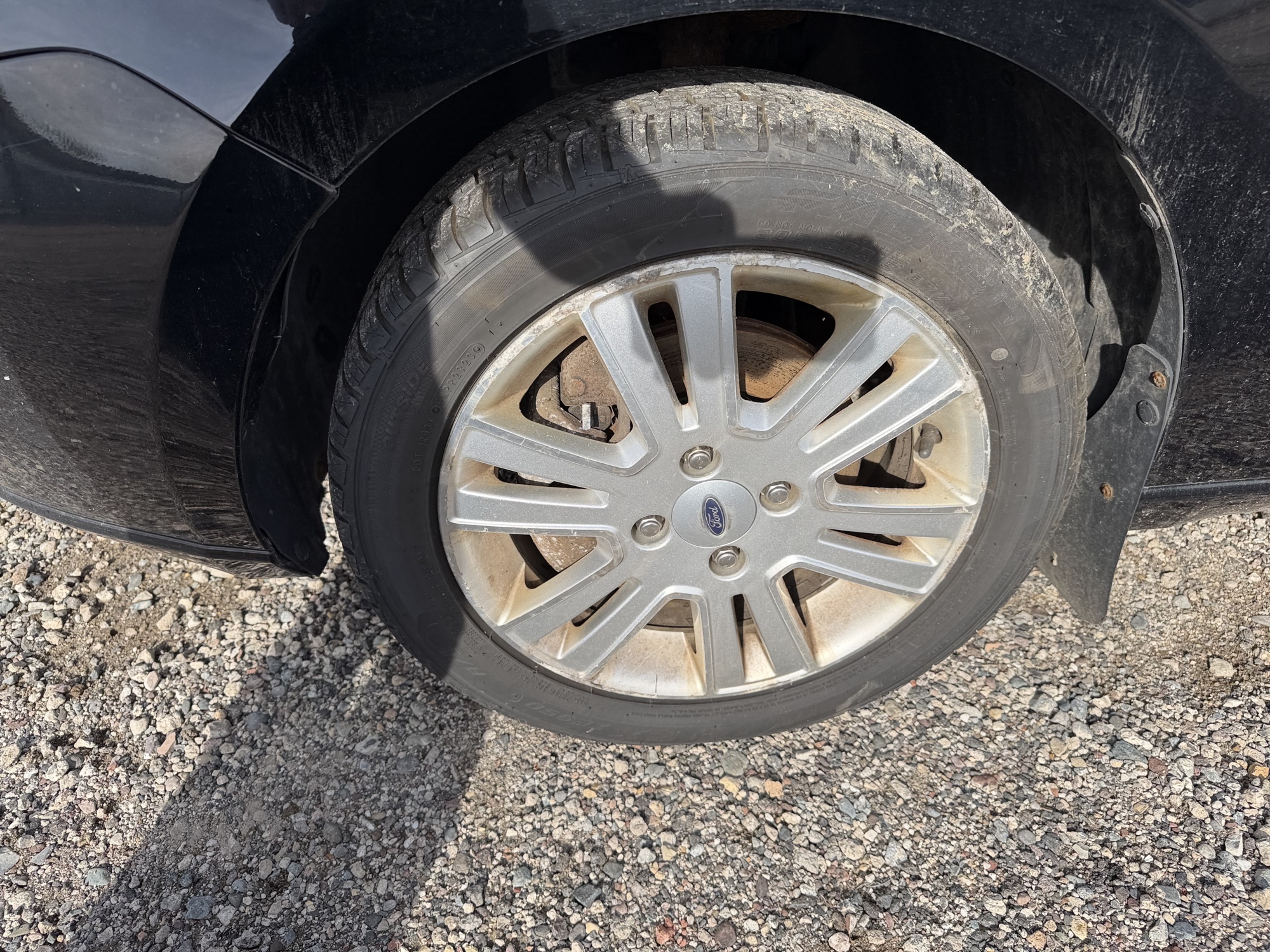 2010 ford focus sel-sedan with 180168 miles for sale near Elk River, Minnesota 106939_12_drv_front_wheel.jpg