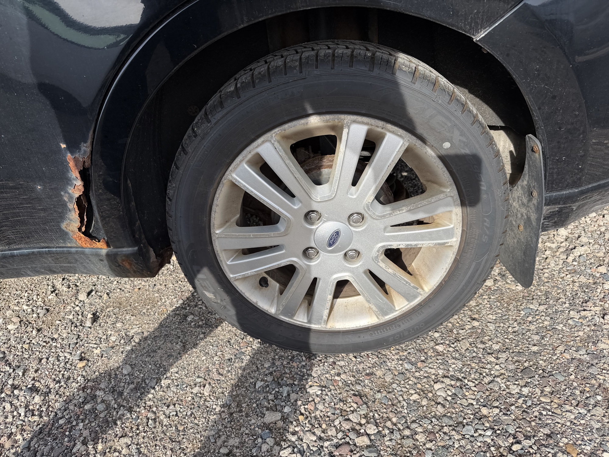 2010 ford focus sel-sedan with 180168 miles for sale near Elk River, Minnesota 106939_13_rear_drv_wheel.jpg