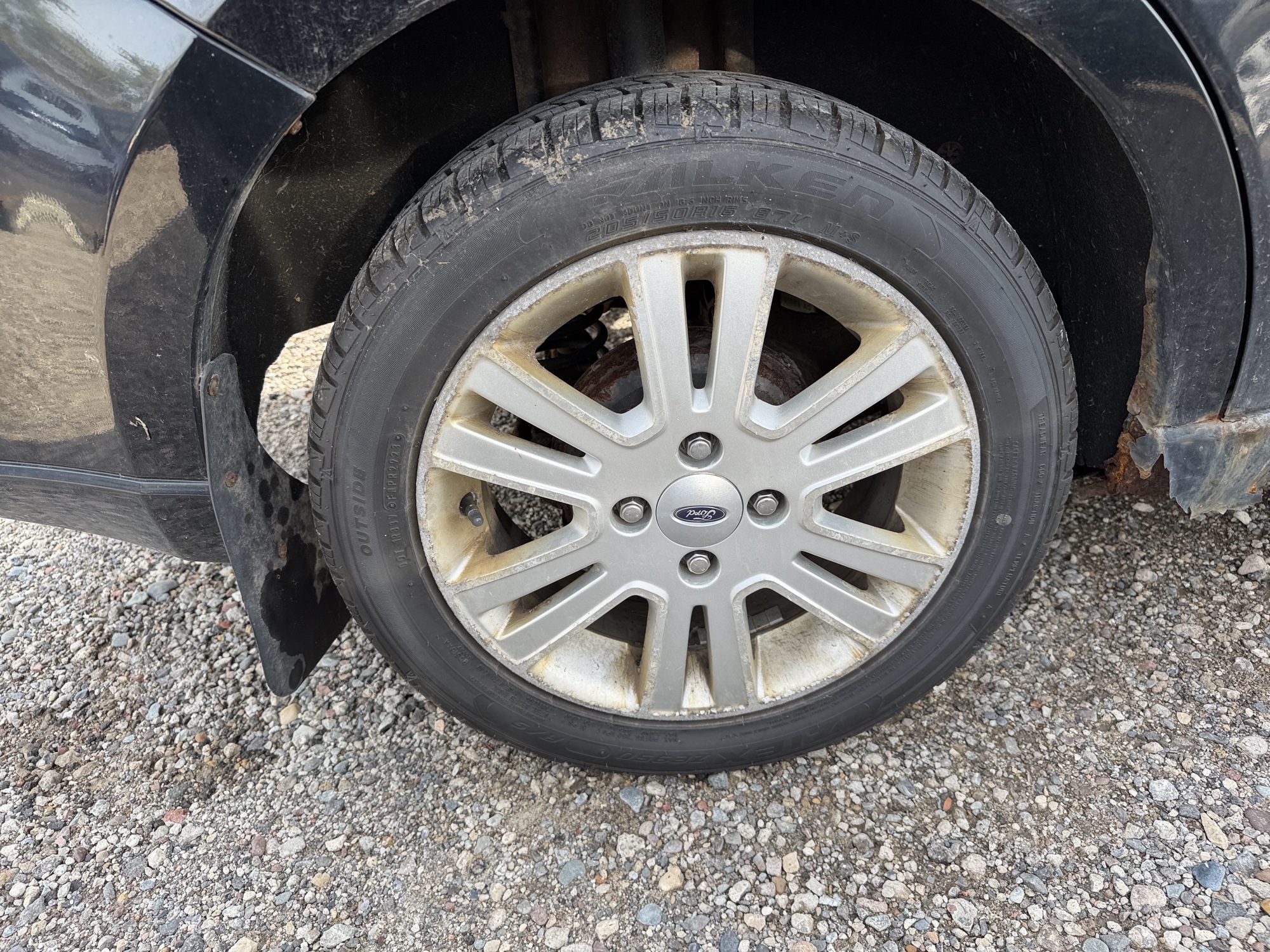 2010 ford focus sel-sedan with 180168 miles for sale near Elk River, Minnesota 106939_14_rear_pass_wheel.jpg