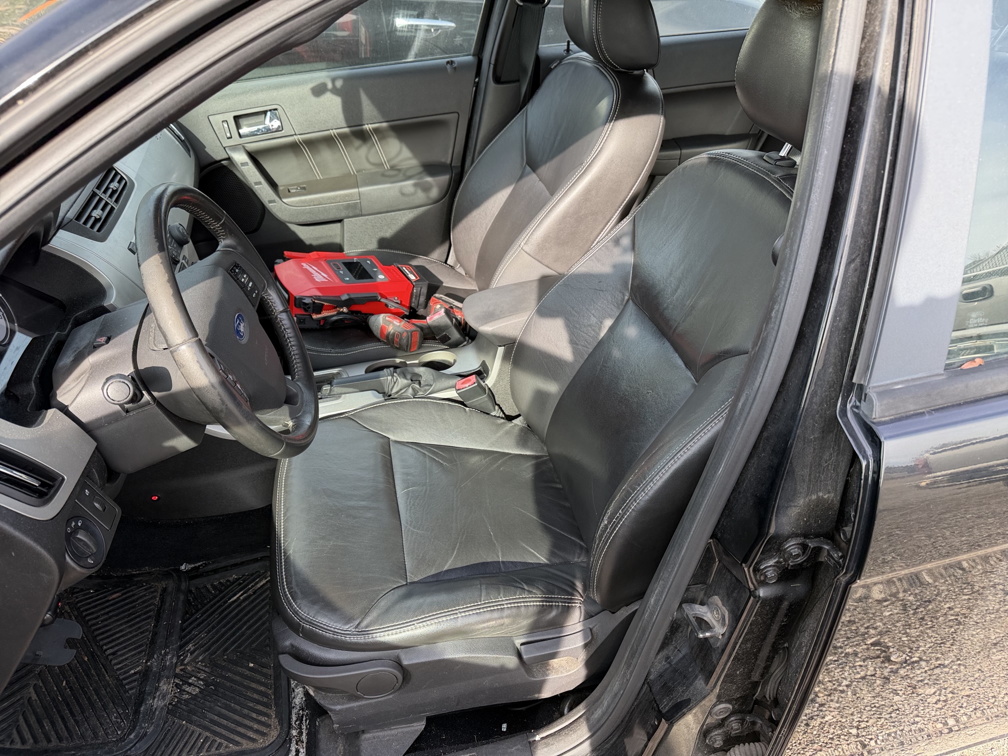 2010 ford focus sel-sedan with 180168 miles for sale near Elk River, Minnesota 106939_22_driver_seat.jpg