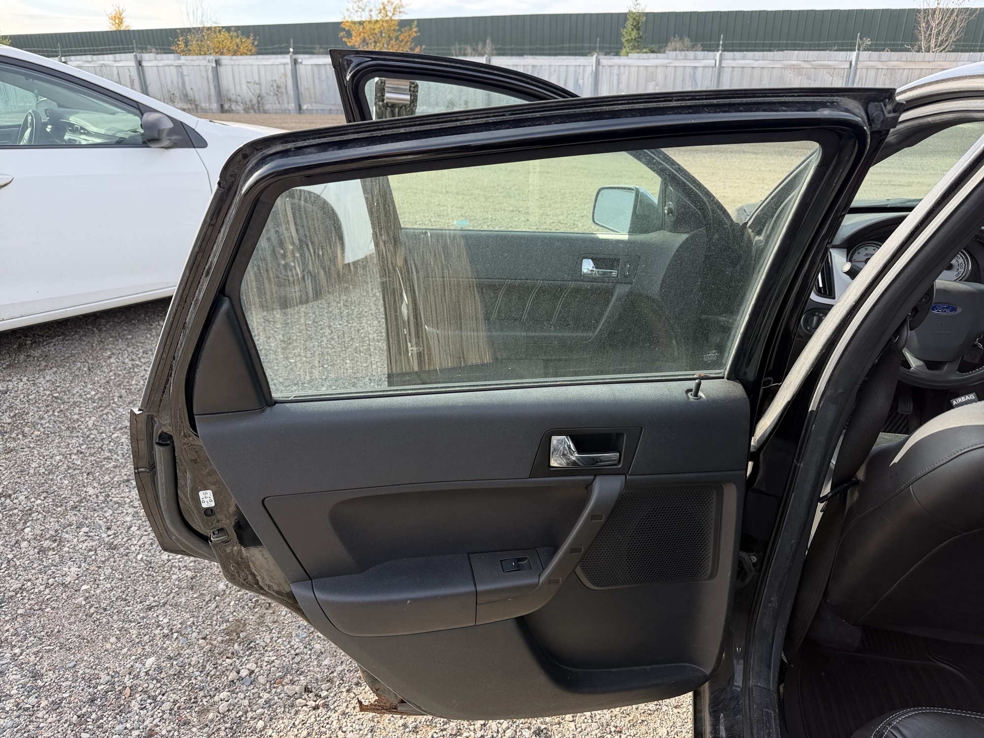 2010 ford focus sel-sedan with 180168 miles for sale near Elk River, Minnesota 106939_25_drv_rear_door_panel.jpg
