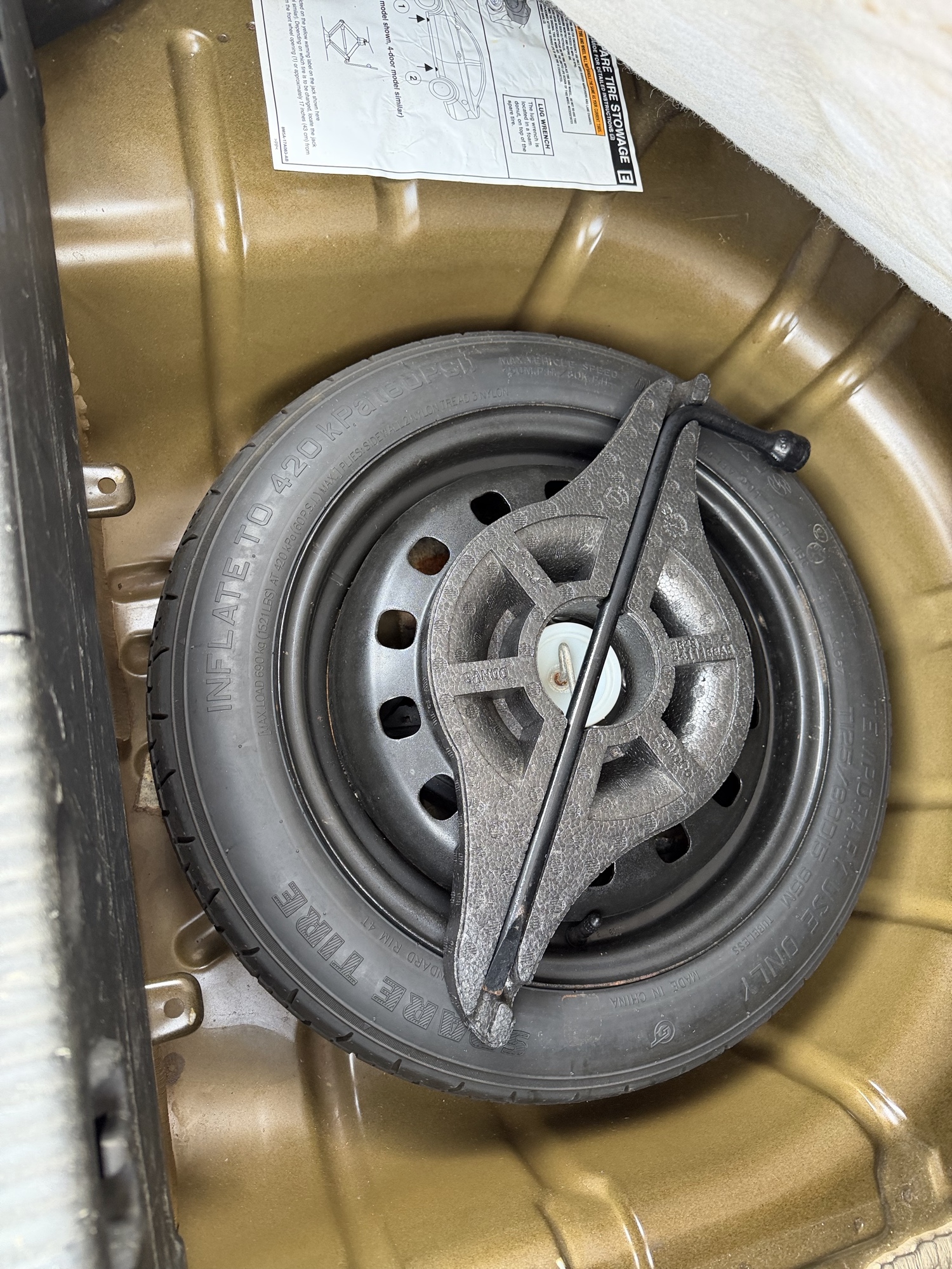 2010 ford focus sel-sedan with 180168 miles for sale near Elk River, Minnesota 106939_27_spare_tire.jpg