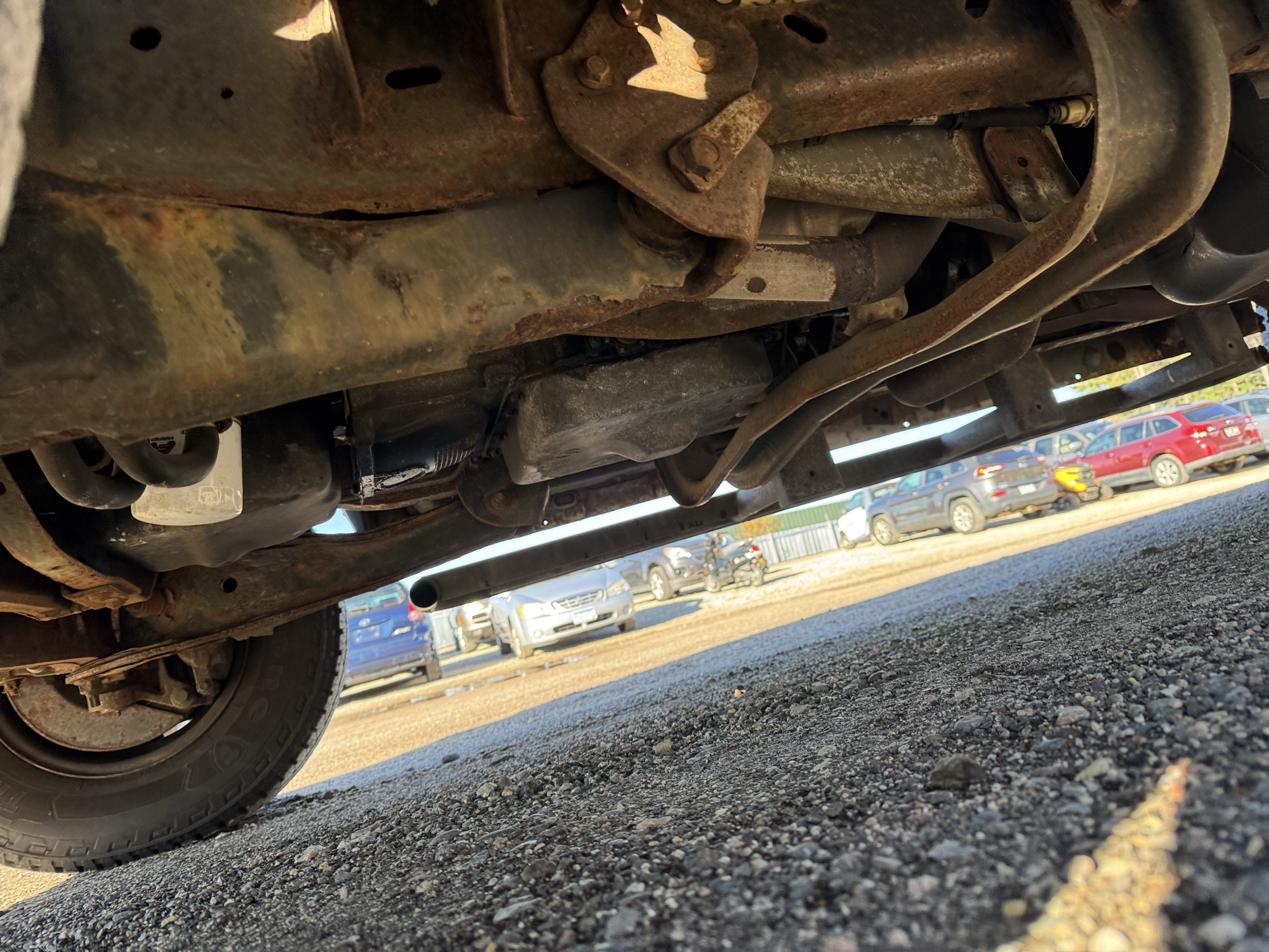 2013 ford econoline e-250 with 188890 miles for sale near Elk River, Minnesota 106947_17_undercar_drv_side.jpg