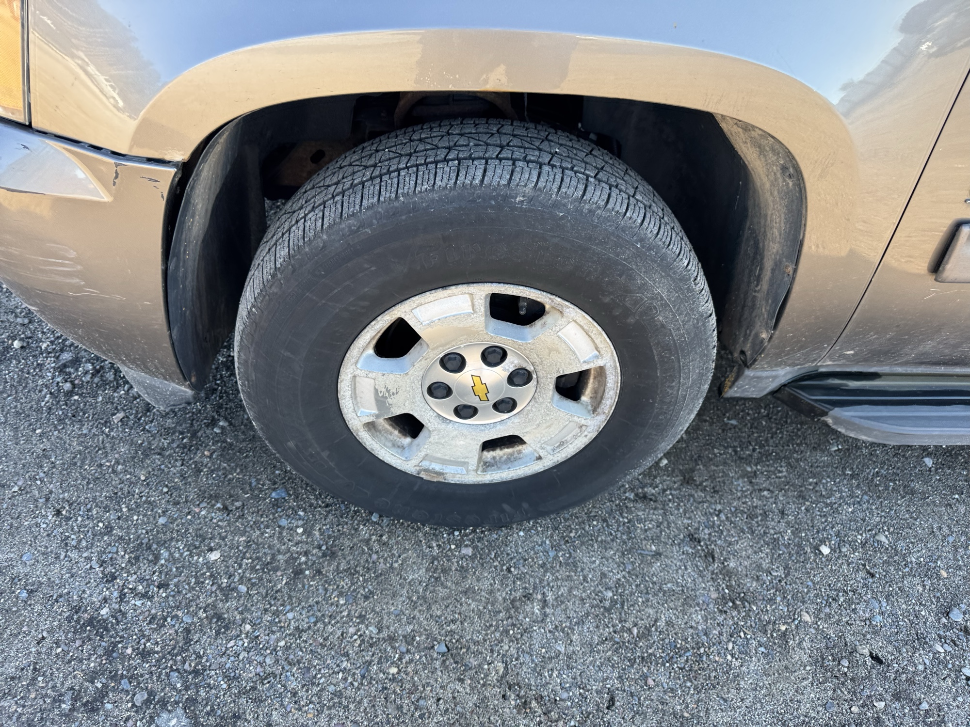 2012 chevrolet suburban lt-1500-4wd with 235557 miles for sale near Elk River, Minnesota 106953_12_drv_front_wheel.jpg