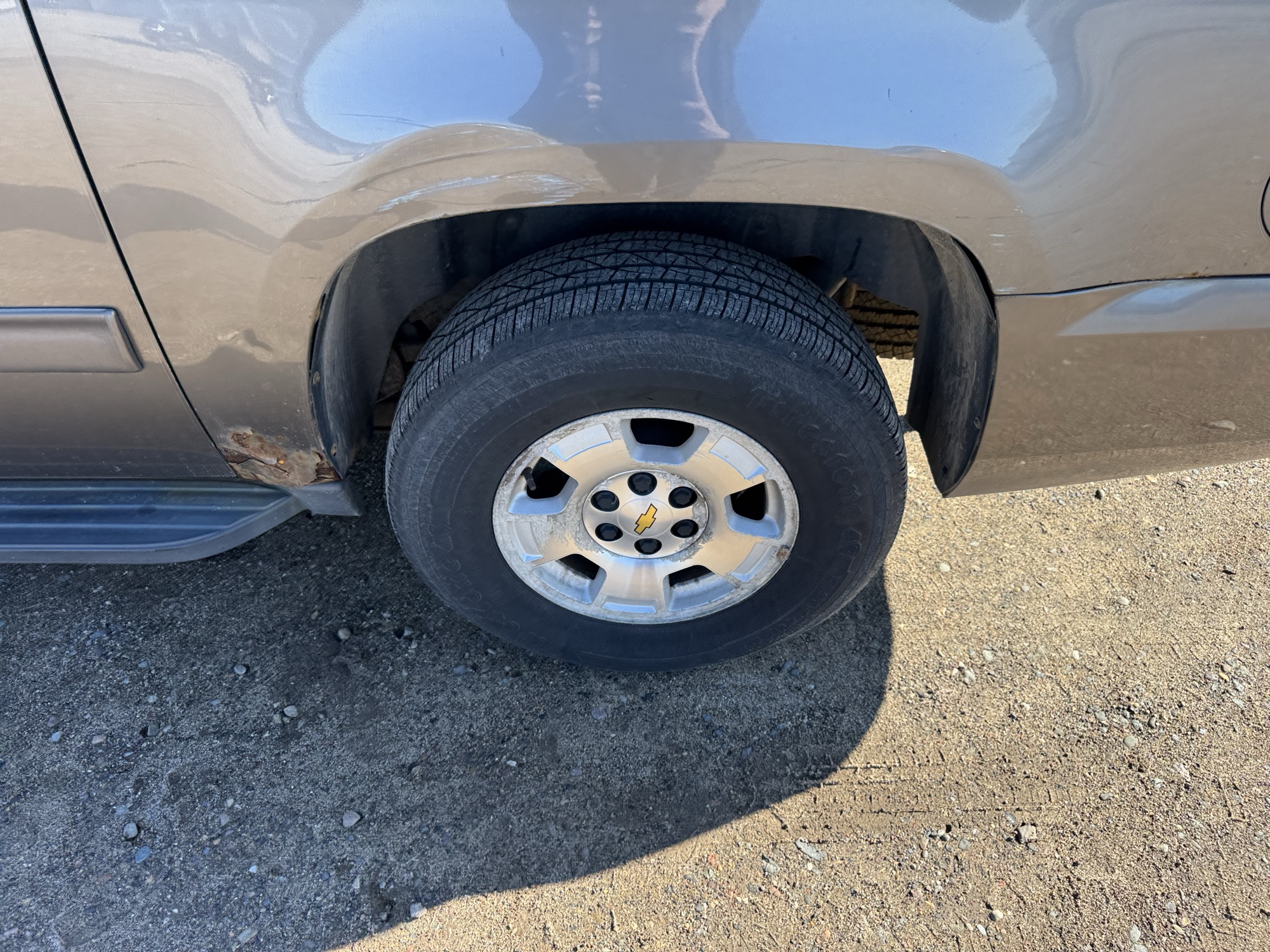 2012 chevrolet suburban lt-1500-4wd with 235557 miles for sale near Elk River, Minnesota 106953_13_rear_drv_wheel.jpg