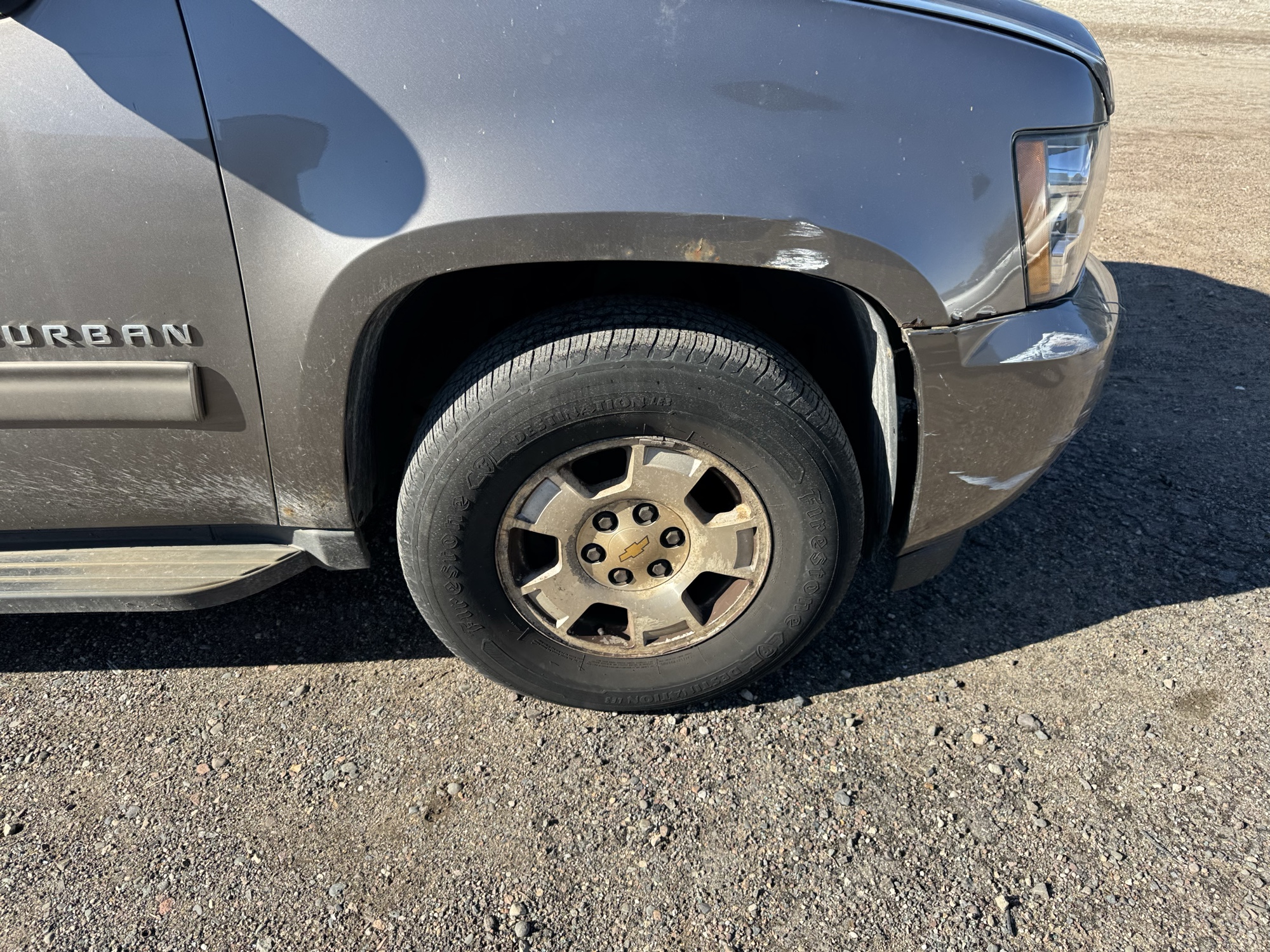 2012 chevrolet suburban lt-1500-4wd with 235557 miles for sale near Elk River, Minnesota 106953_15_front_pass_wheel.jpg