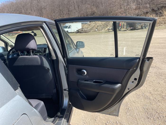 2007 nissan versa 1.8-s with 186981 miles for sale near jordan, minnesota 4faef44967f4469daa775116bd079061.jpeg