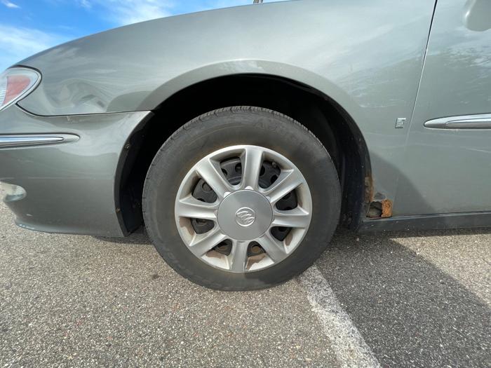 2008 buick lacrosse cx with 164609 miles for sale near lake-elmo, minnesota 78f4323b9ce14132bbce7c29a792a094.jpeg