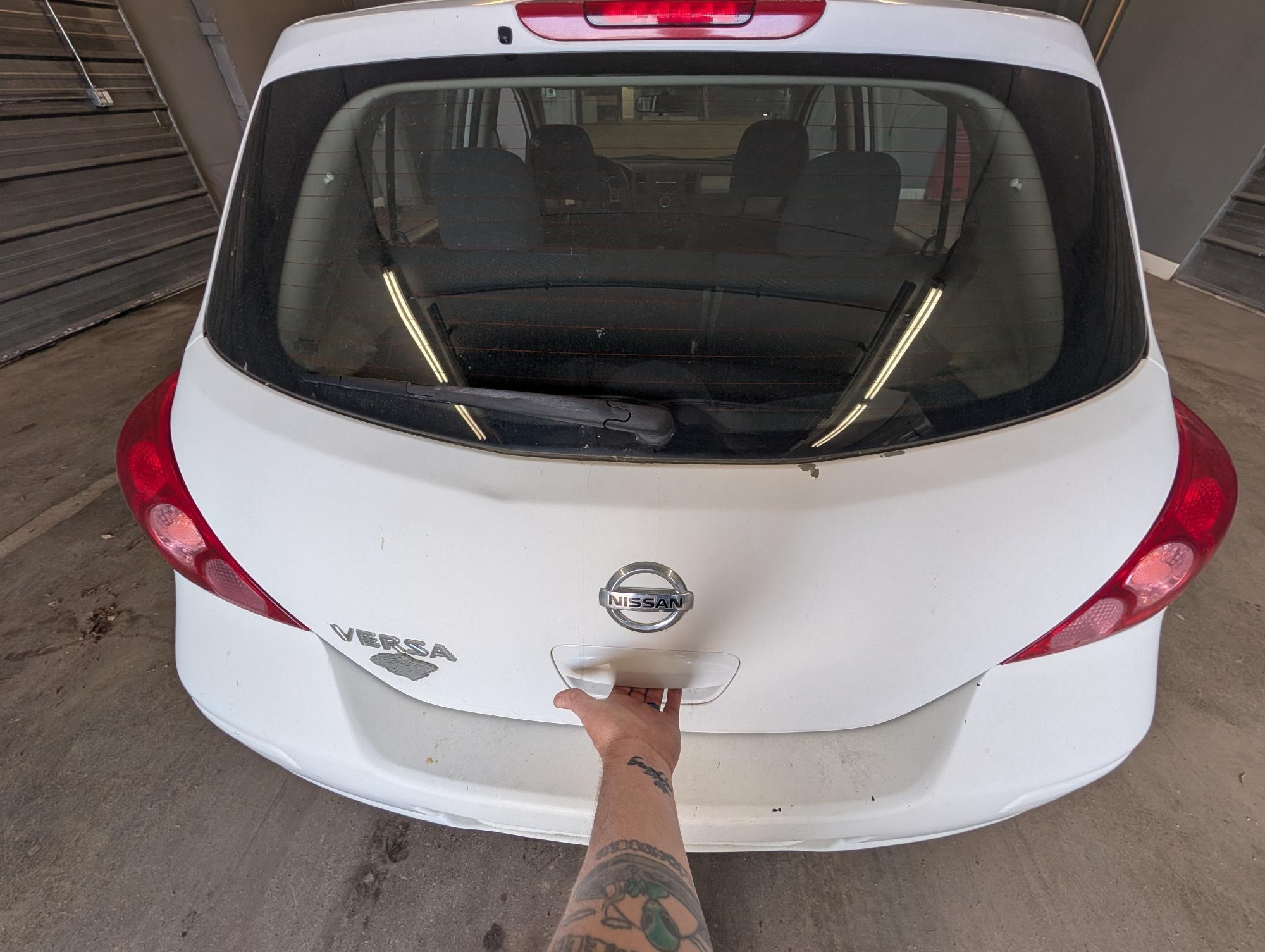 2012 nissan versa 1.8-sl-hatchback with 235732 miles for sale near elk-river, minnesota e3a77331d3a54fab858df61e1685041f.jpg