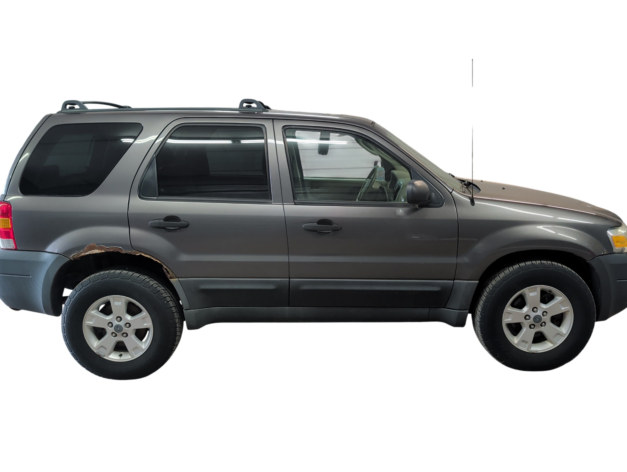 2005 ford escape xlt-4wd with 137067 miles for sale near elk-river, minnesota 106306_06_pass_side.jpg