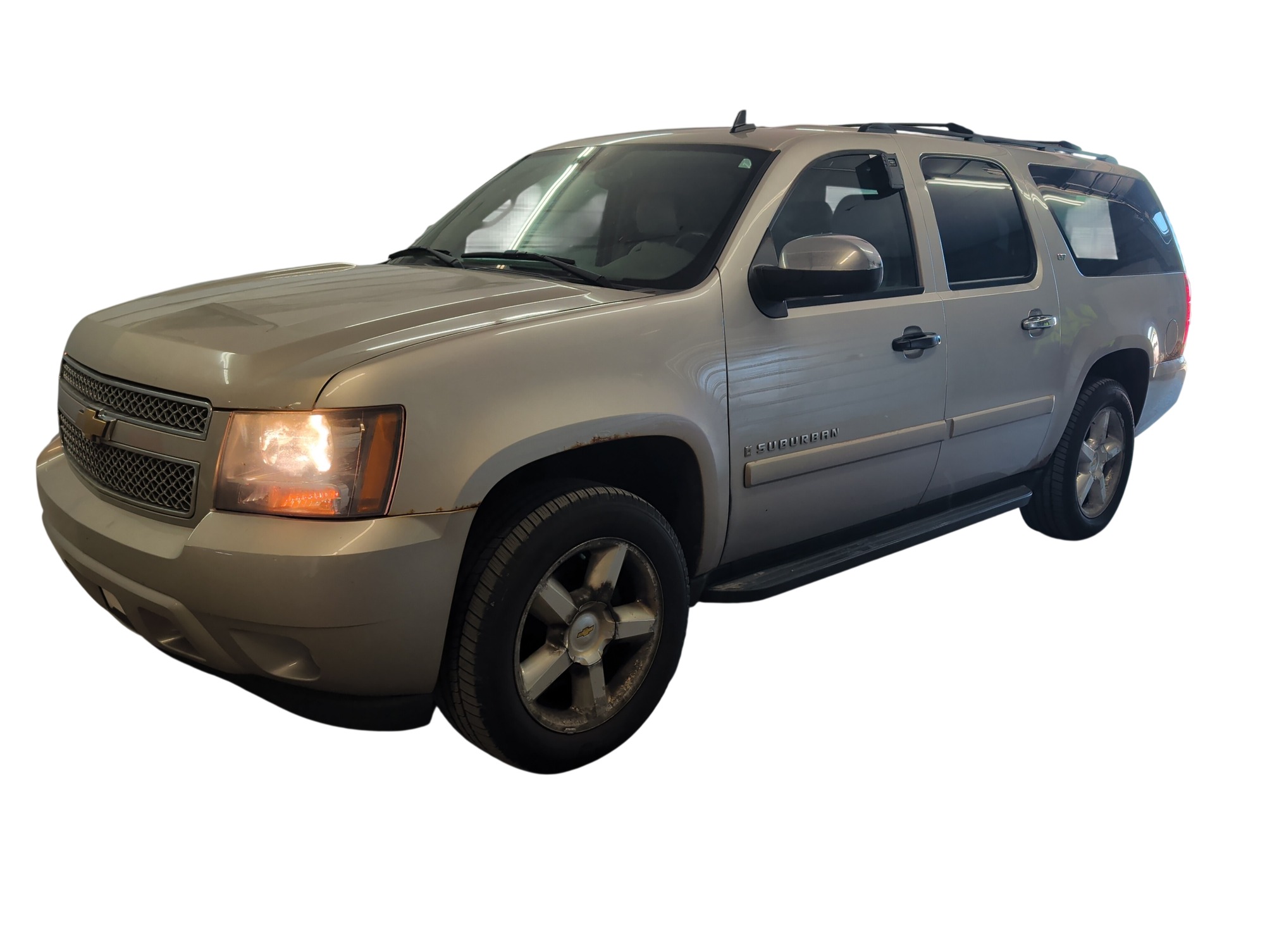2007 chevrolet suburban ls-1500-4wd with 182367 miles for sale near elk-river, minnesota 106439_01_driver_front_corner.jpg