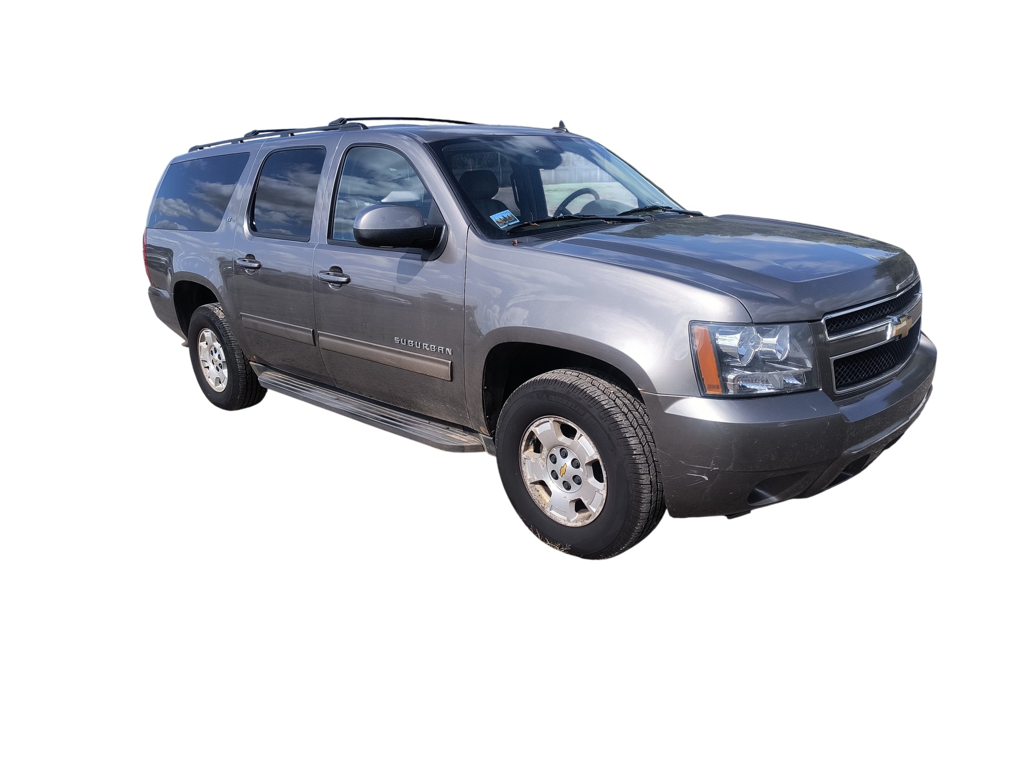 2013 chevrolet suburban ltz-1500-4wd with 215158 miles for sale near elk-river, minnesota 106563_07_pass_front_corner.jpg
