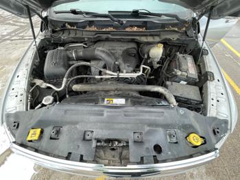 2015 ram 1500 slt-crew-cab-swb-4wd with 128735 miles 07fd1d9a26004eda9c693f38ed387290.jpeg