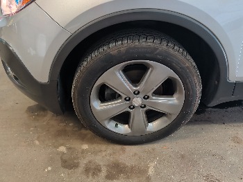 2013 buick encore premium-awd with 117195 miles for sale near elk-river, minnesota 105965_12_drv_front_wheel.jpg