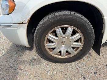 2005 chrysler town-and-country touring with 150988 miles for sale near elk-river, minnesota 106132_12_drv_front_wheel.jpg