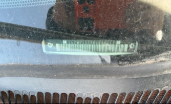 2006 pontiac grand-prix base with 237218 miles for sale near elk-river, minnesota 106150_48_windshield_vin_plate.jpg