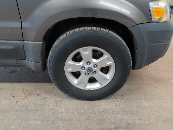 2005 ford escape xlt-4wd with 137067 miles for sale near elk-river, minnesota 106306_15_front_pass_wheel.jpg