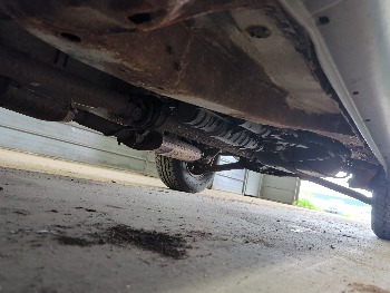 2005 ford escape xlt-4wd with 137067 miles for sale near elk-river, minnesota 106306_17_undercar_drv_side.jpg