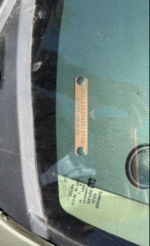 2004 mazda mpv lx with 94040 miles for sale near elk-river, minnesota 106309_48_windshield_vin_plate.jpg