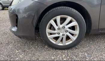 2012 mazda mazda3 i-touring-4-door with 105844 miles for sale near elk-river, minnesota 106316_12_drv_front_wheel.jpg