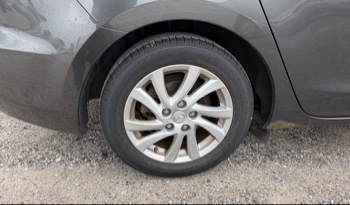 2012 mazda mazda3 i-touring-4-door with 105844 miles for sale near elk-river, minnesota 106316_14_rear_pass_wheel.jpg