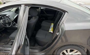 2012 mazda mazda3 i-touring-4-door with 105844 miles for sale near elk-river, minnesota 106316_24_drv_rear_seat.jpg