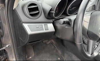 2012 mazda mazda3 i-touring-4-door with 105844 miles for sale near elk-river, minnesota 106316_37_left_of_steering_wheel.jpg
