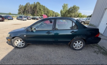 2002 mitsubishi lancer base with 166691 miles for sale near elk-river, minnesota 106319_02_driver_side.jpg