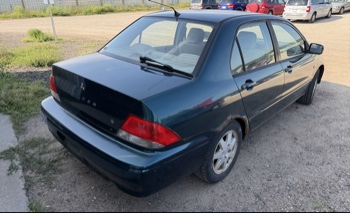 2002 mitsubishi lancer base with 166691 miles for sale near elk-river, minnesota 106319_05_pass_rear_corner.jpg