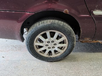 2006 buick terraza cx with 241067 miles for sale near elk-river, minnesota 106322_14_rear_pass_wheel.jpg