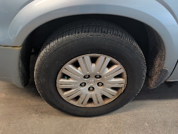 2005 chrysler town-&amp;-country lx with 164706 miles for sale near elk-river, minnesota 106323_12_drv_front_wheel.jpg