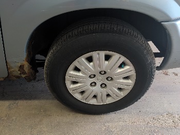 2005 chrysler town-&amp;-country lx with 164706 miles for sale near elk-river, minnesota 106323_13_rear_drv_wheel.jpg
