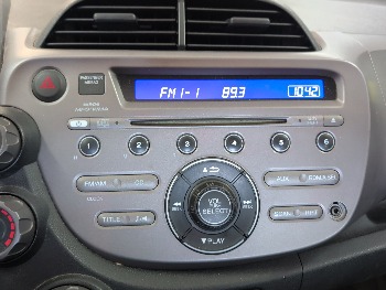 2012 honda fit 5-speed-at with 233788 miles for sale near elk-river, minnesota 106326_39_radio_closeup.jpg