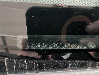 2012 honda fit 5-speed-at with 233788 miles for sale near elk-river, minnesota 106326_48_windshield_vin_plate.jpg