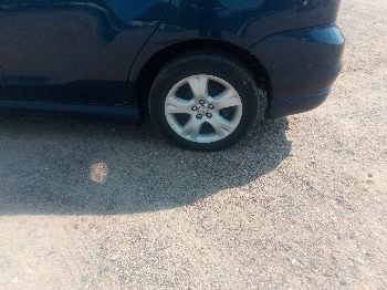2004 toyota matrix 4wd with 192868 miles for sale near elk-river, minnesota 106327_13_rear_drv_wheel.jpg