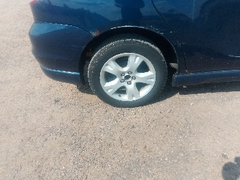 2004 toyota matrix 4wd with 192868 miles for sale near elk-river, minnesota 106327_14_rear_pass_wheel.jpg