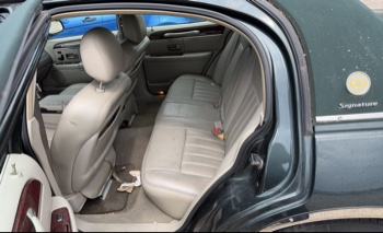 2003 lincoln town-car signature with 110292 miles for sale near elk-river, minnesota 106334_24_drv_rear_seat.jpg