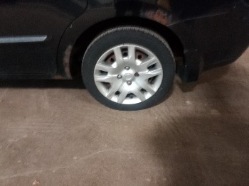 2011 nissan sentra with 198610 miles for sale near elk-river, minnesota 106335_13_rear_drv_wheel.jpg