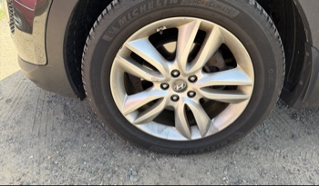 2013 hyundai santa-fe sport-2.0-awd with 164239 miles for sale near elk-river, minnesota 106336_12_drv_front_wheel.jpg