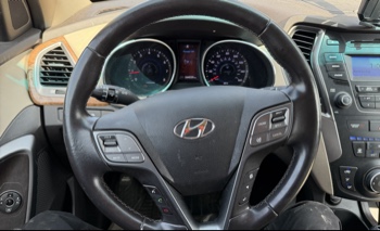 2013 hyundai santa-fe sport-2.0-awd with 164239 miles for sale near elk-river, minnesota 106336_36_steering_wheel.jpg