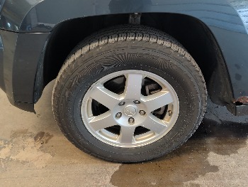 2008 jeep grand-cherokee laredo-4wd with 85427 miles for sale near elk-river, minnesota 106340_12_drv_front_wheel.jpg
