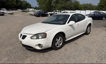 2008 pontiac grand-prix sedan with 118916 miles for sale near elk-river, minnesota 106356_01_driver_front_corner.jpg