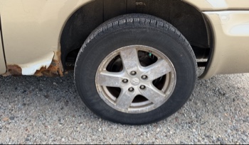 2007 dodge grand-caravan sxt with 141064 miles for sale near elk-river, minnesota 106358_13_rear_drv_wheel.jpg