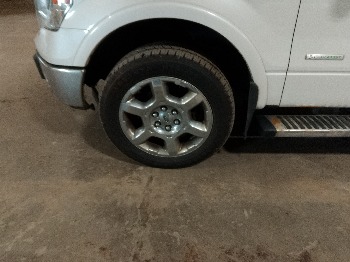 2013 ford f-150 fx4-supercrew-5.5-ft.-bed-4wd with 219754 miles for sale near elk-river, minnesota 106359_12_drv_front_wheel.jpg