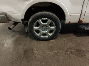 2013 ford f-150 fx4-supercrew-5.5-ft.-bed-4wd with 219754 miles for sale near elk-river, minnesota 106359_14_rear_pass_wheel.jpg