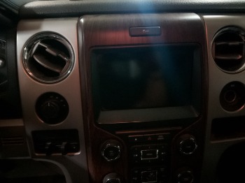 2013 ford f-150 fx4-supercrew-5.5-ft.-bed-4wd with 219754 miles for sale near elk-river, minnesota 106359_39_radio_closeup.jpg