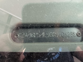 2006 chrysler town-and-country with 141109 miles for sale near elk-river, minnesota 106367_48_windshield_vin_plate.jpg
