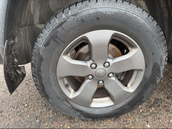 2013 jeep grand-cherokee laredo-4wd with 134157 miles for sale near elk-river, minnesota 106371_14_rear_pass_wheel.jpg