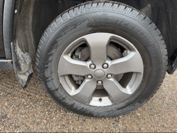 2013 jeep grand-cherokee laredo-4wd with 134157 miles for sale near elk-river, minnesota 106371_15_front_pass_wheel.jpg